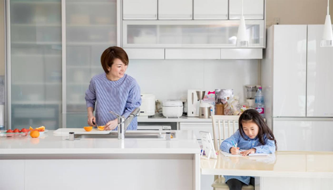 Love at first site in the showroom Kitchen the source of mom’s smile