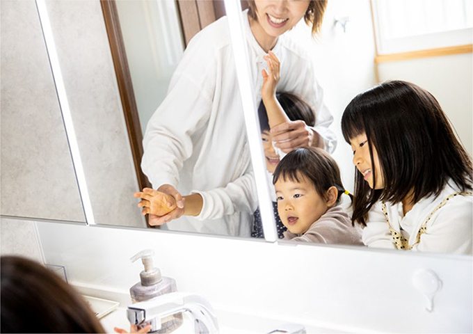 Washstand with generous storage gives everyone enough room
