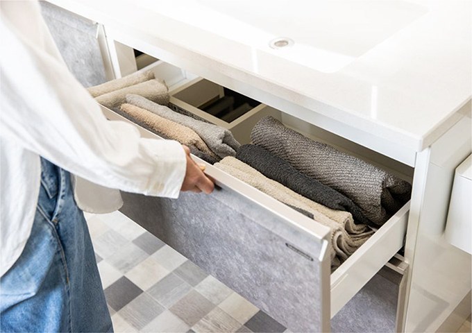Washstand with generous storage gives everyone enough room